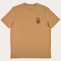 A tan short-sleeve crewneck t-shirt with a small dark brown graphic on the left chest, displayed flat against a solid white background.