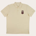 A cream-colored short-sleeve polo shirt with a small embroidered crest on the left chest, displayed flat against a white background.